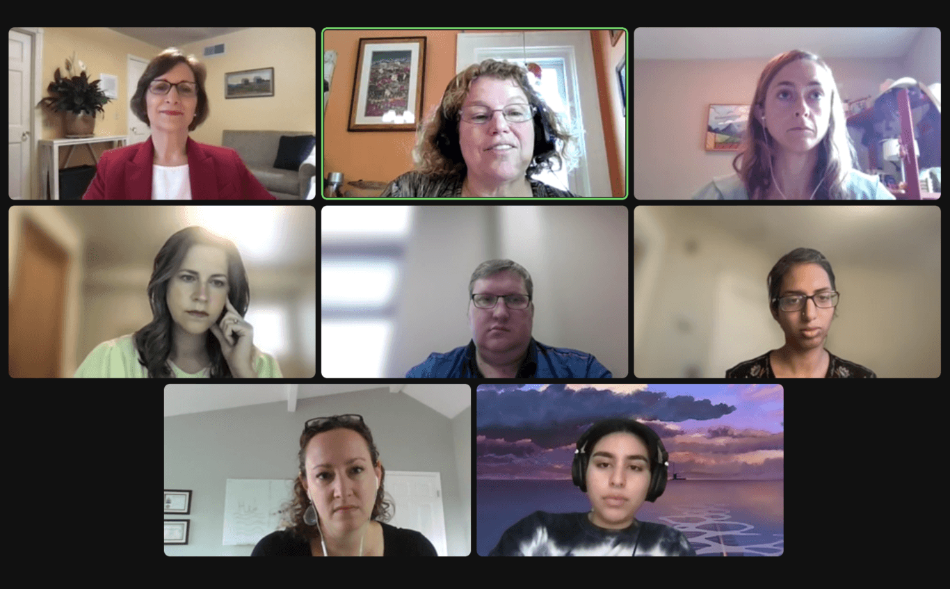 A still from the roundtable video featuring eight speakers on a Zoom call.